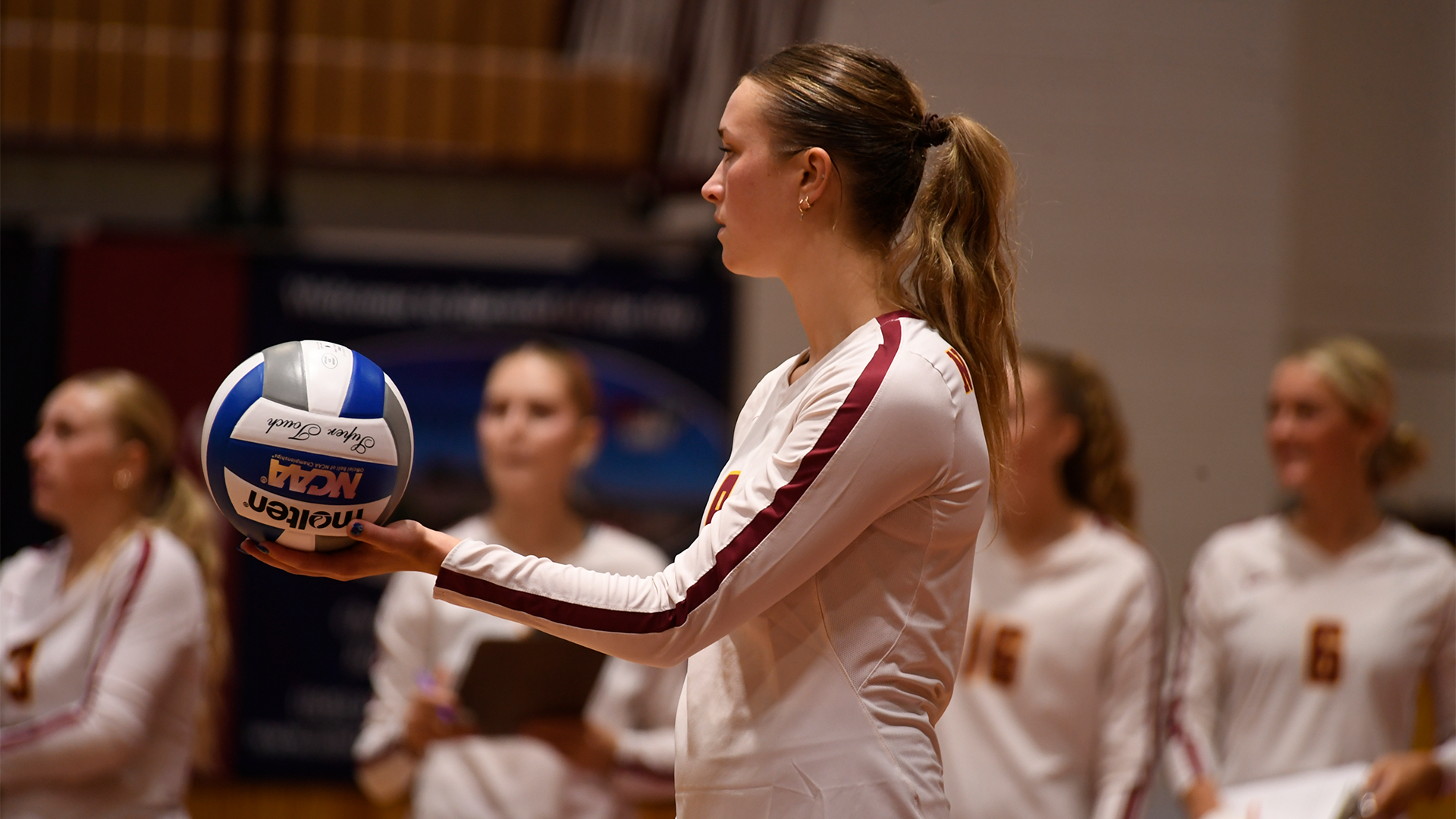 9.16 Volleyball Preview - Setter Ava Nilsson holds the ball about to serve