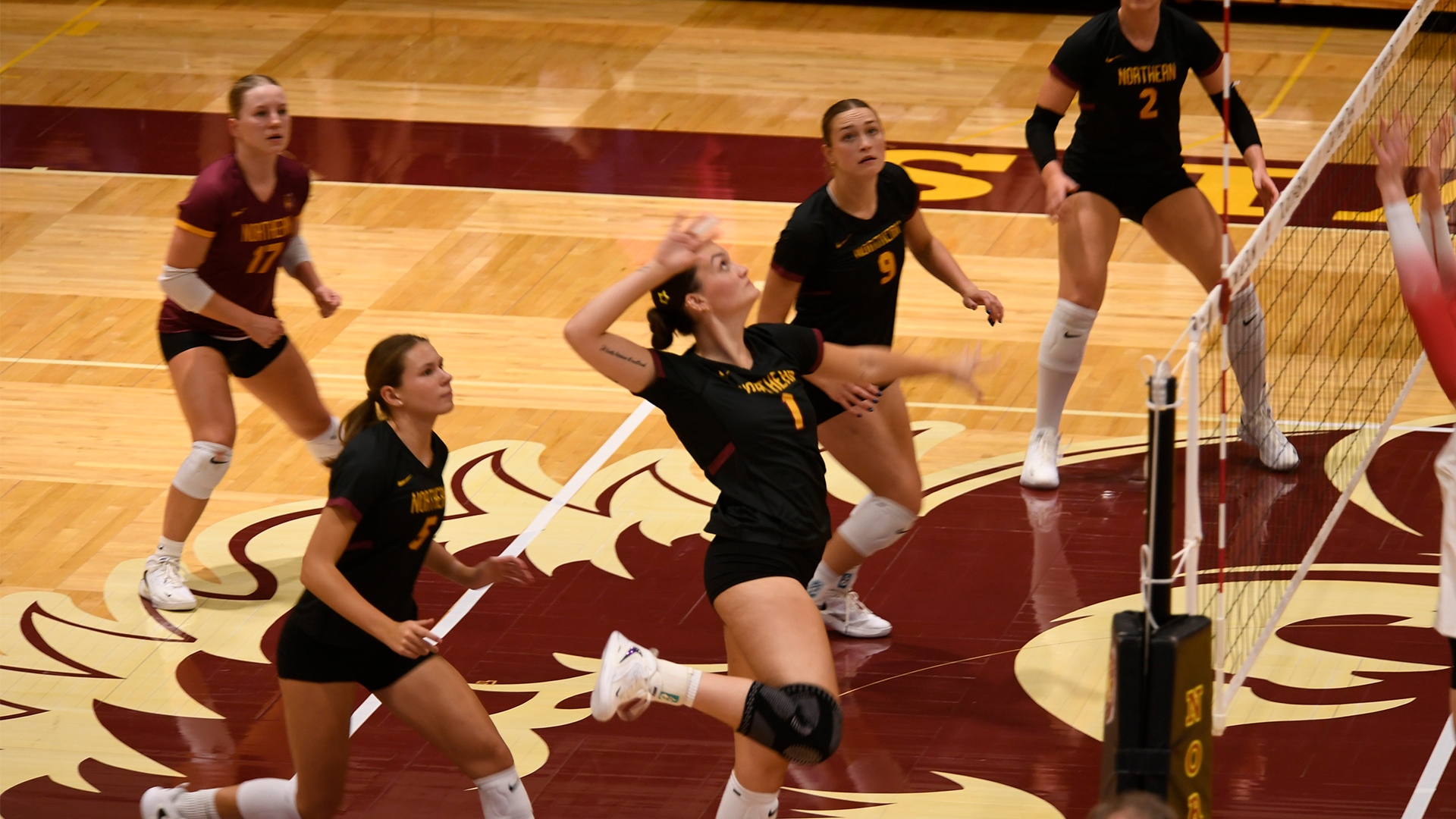 9.19 VB Recap - Victoria Persha goes up for the attack as the rest of the team looks on