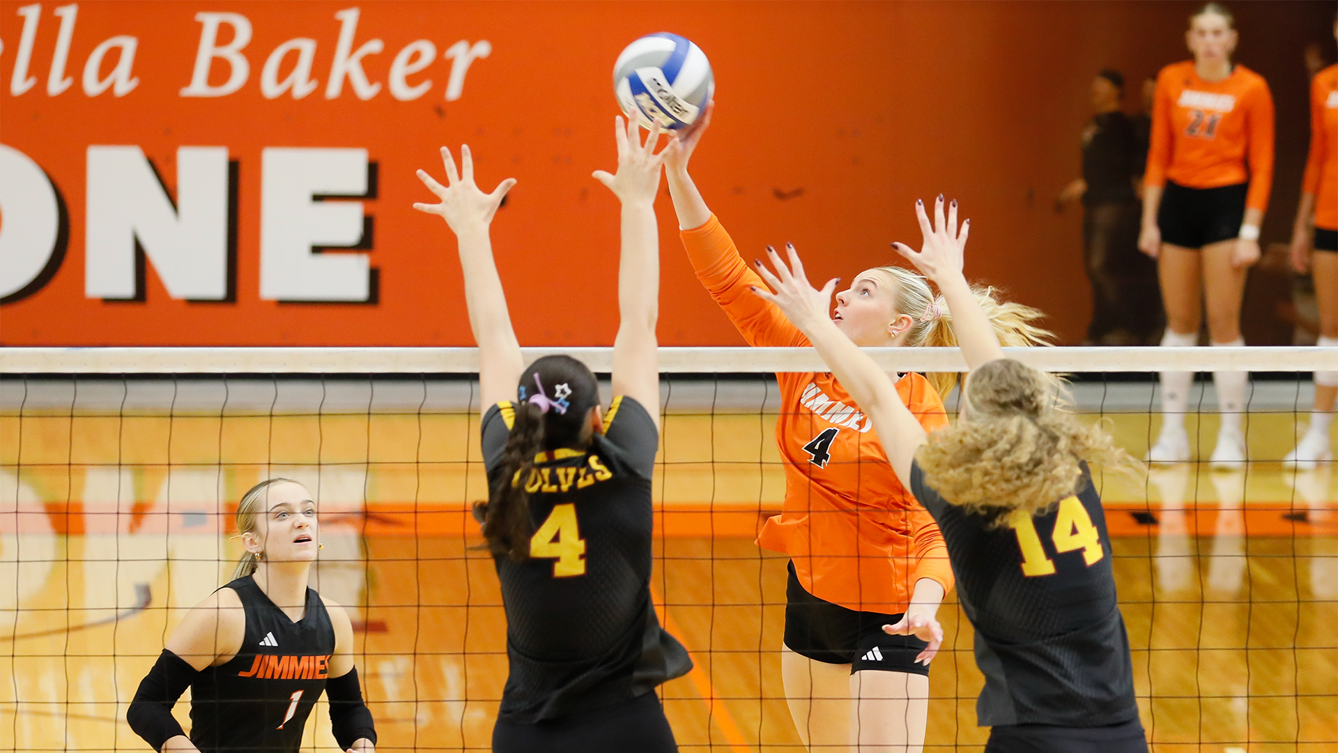 9.24 Volleyball Recap - Lydia Nelson and Morissen Samuels jump to block an attack from Jamestown player