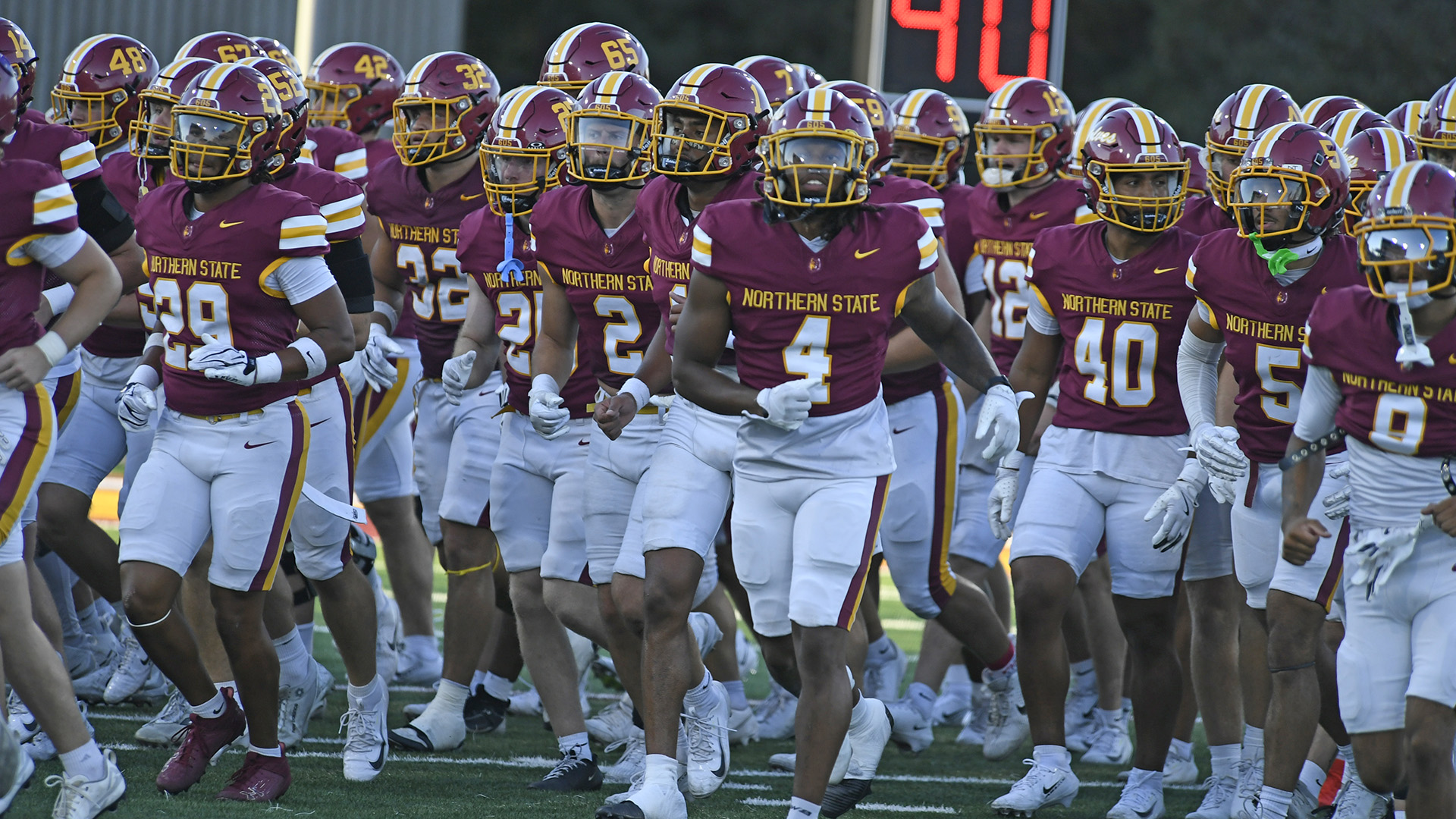 Team running out from the huddle