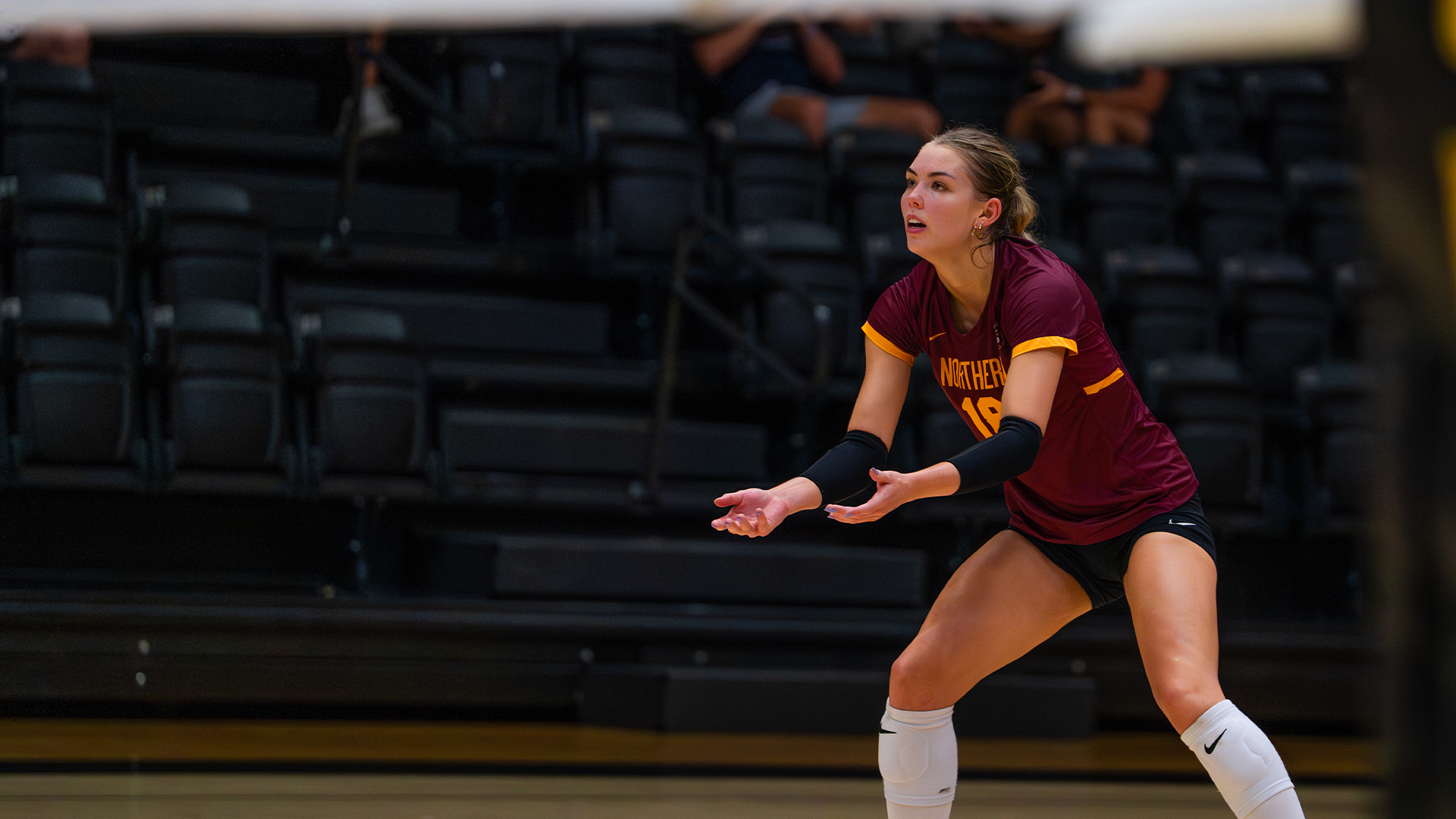 Linnea Nesheim gets set, ready to receive a serve