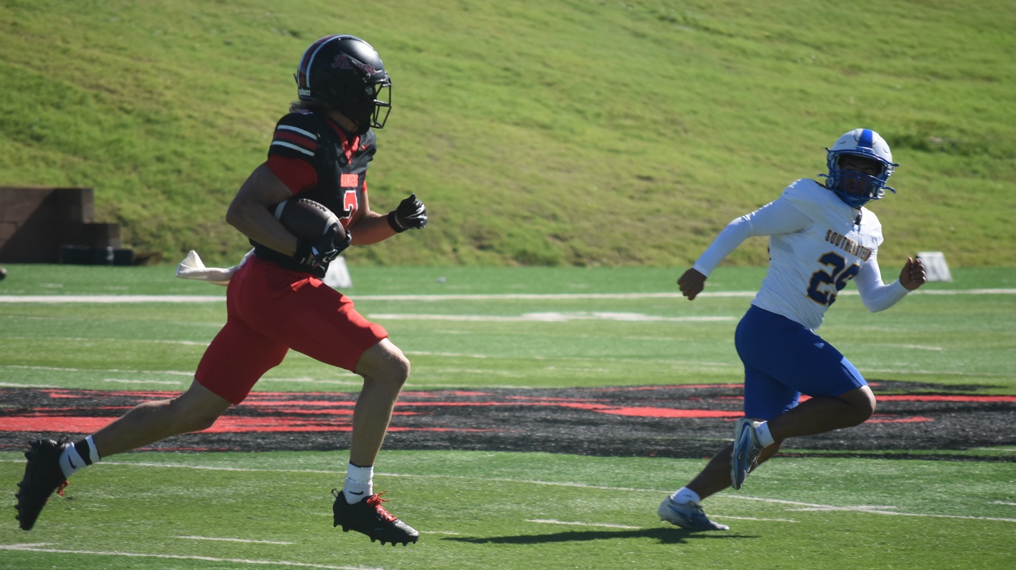 Weston Tucker runs with the ball