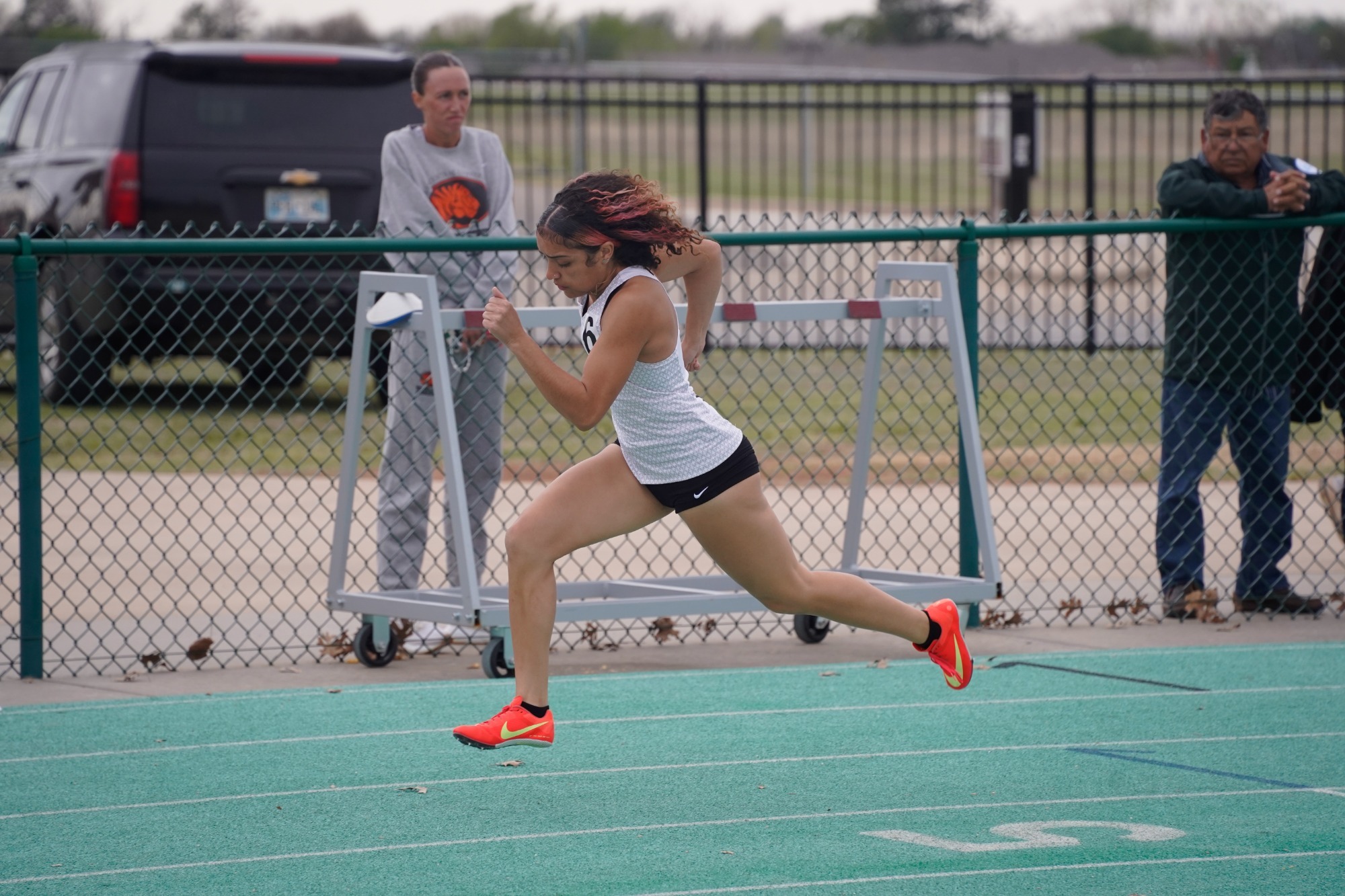 Women's Track Athlete preparing to participate in her event