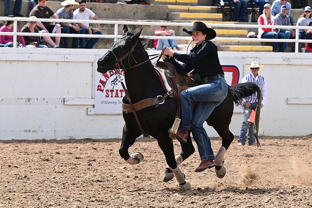 Rodeo member Payton Dingman Dismounting the Horse