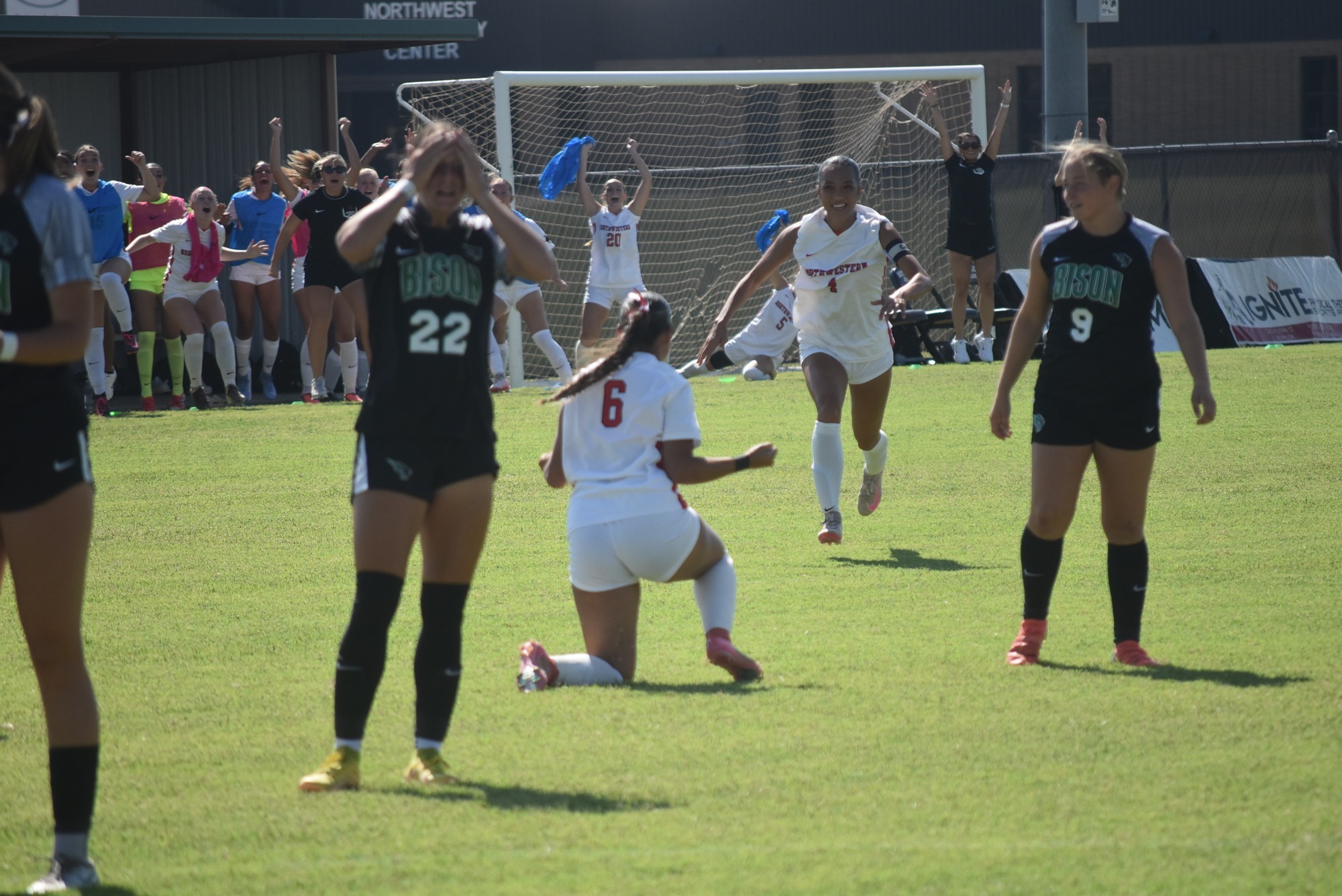Northwestern Soccer Players celebrating a goal