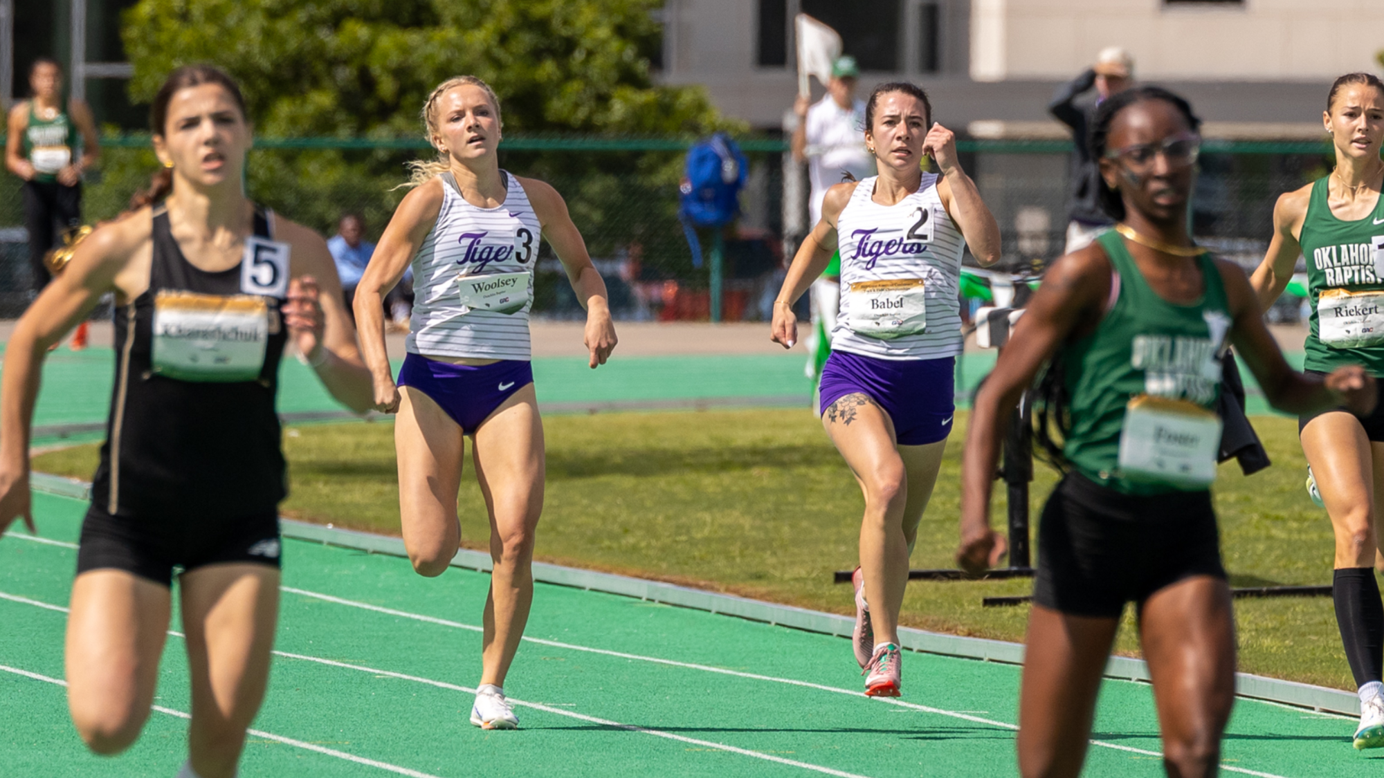 Woolsey and Babel running at 2025 GAC Track Championships