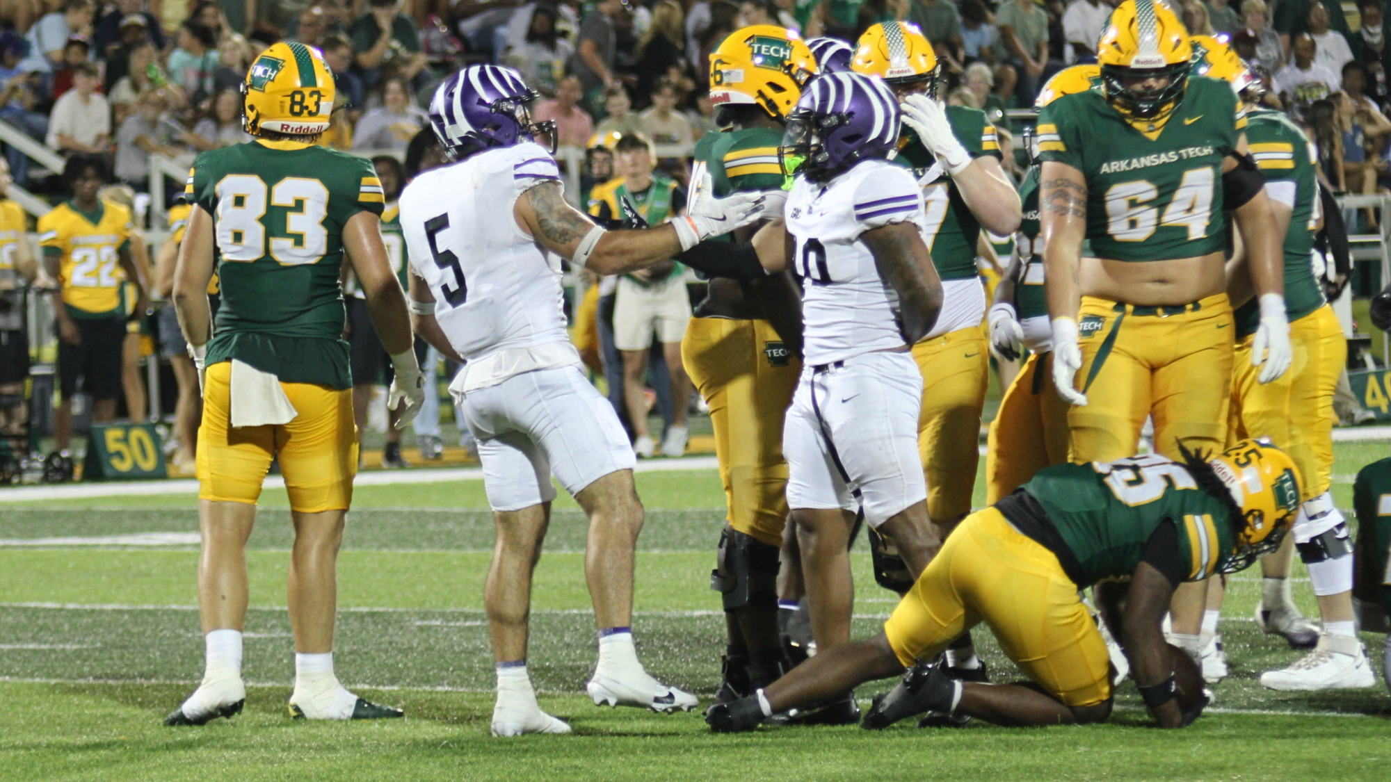 Crutchmer and Smith celebrate defensive stop vs Tech 2026