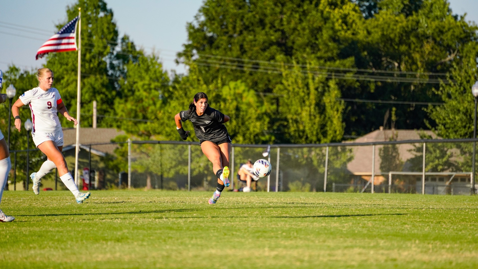 Sophia Acuna clearing the ball