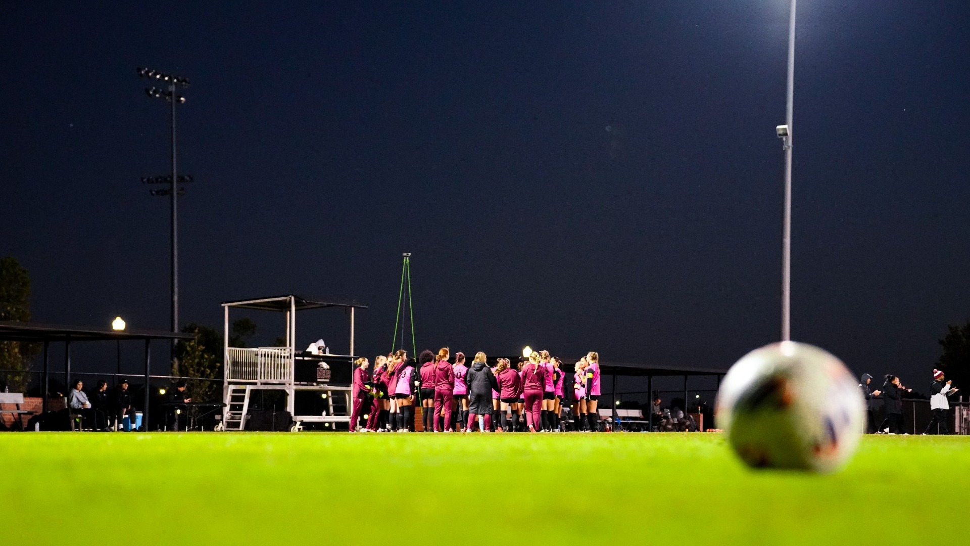 women's soccer team huddle