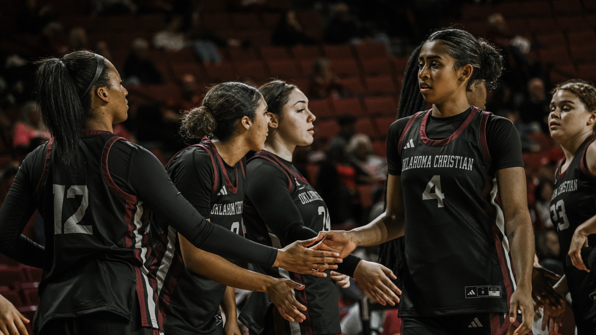 Lopez and team high-fiving