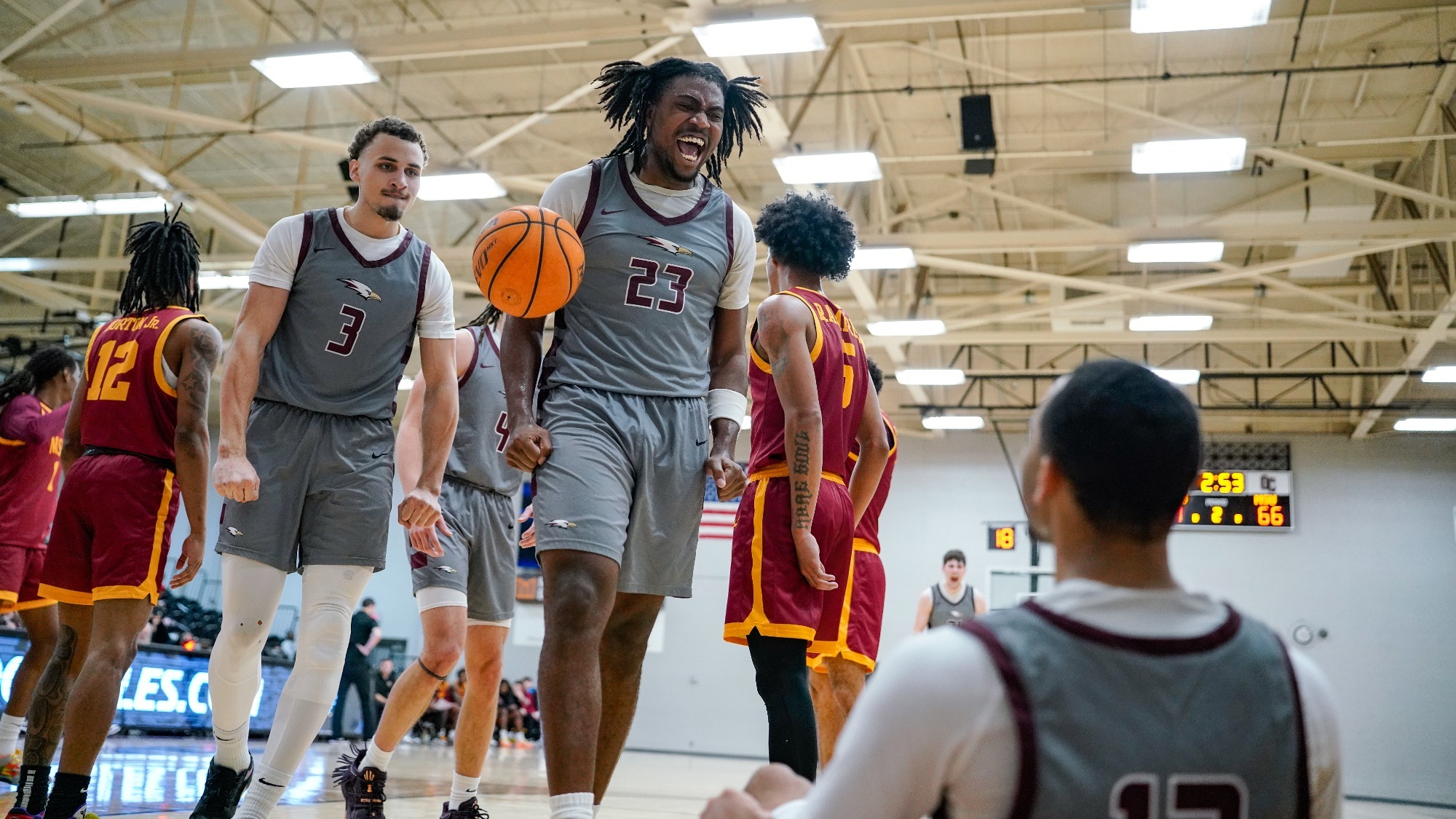 Gibson and Clark celebrating Howell and-1