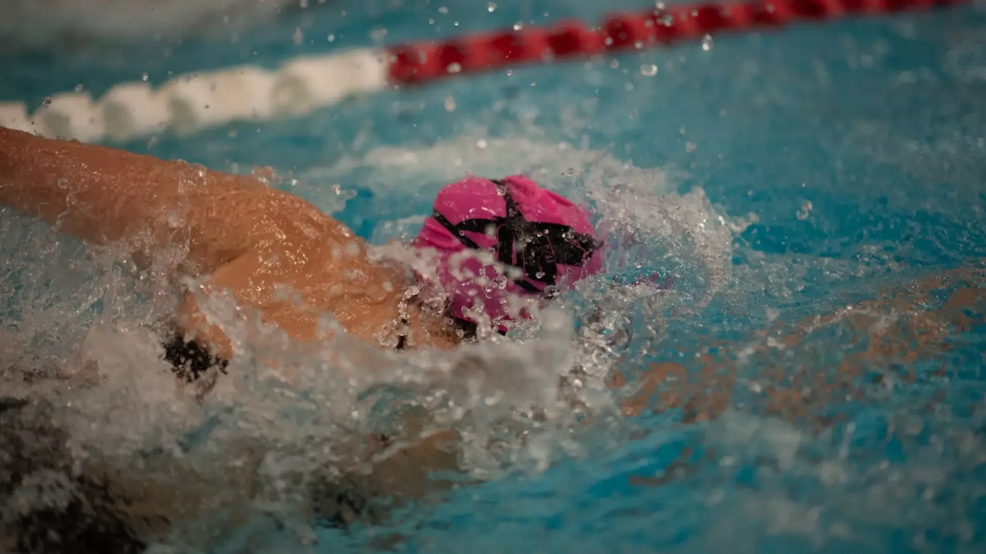 OC female freestyle swimmer