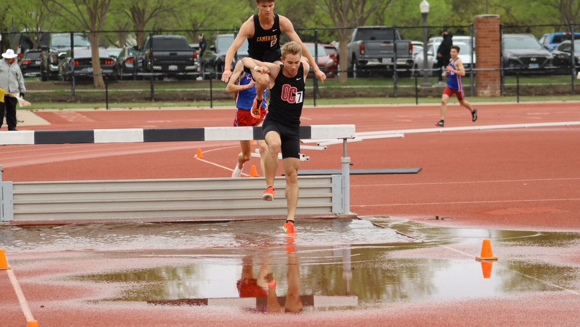 Cade Berkey running in the steeple chase