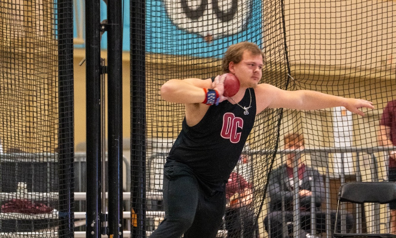 Morrison throwing shot-put