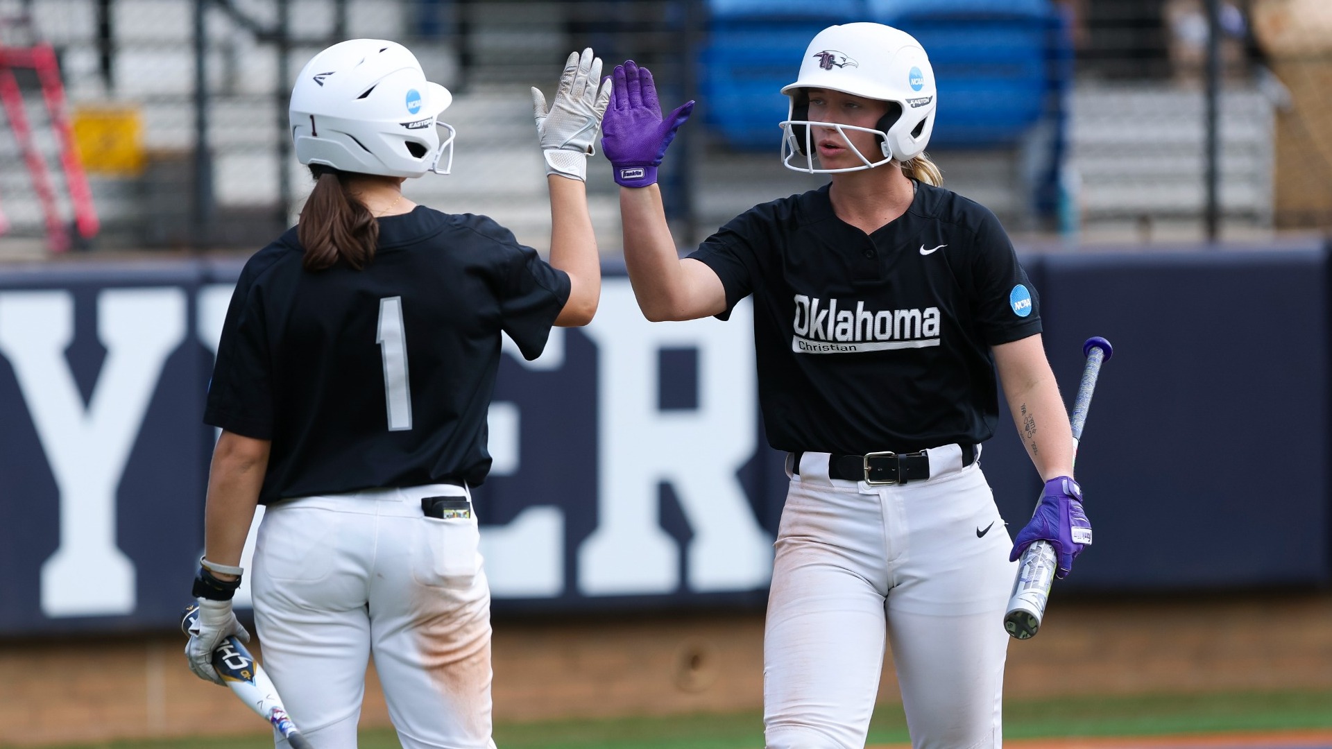 Ki. Brewster high-fiving Grace Anderson