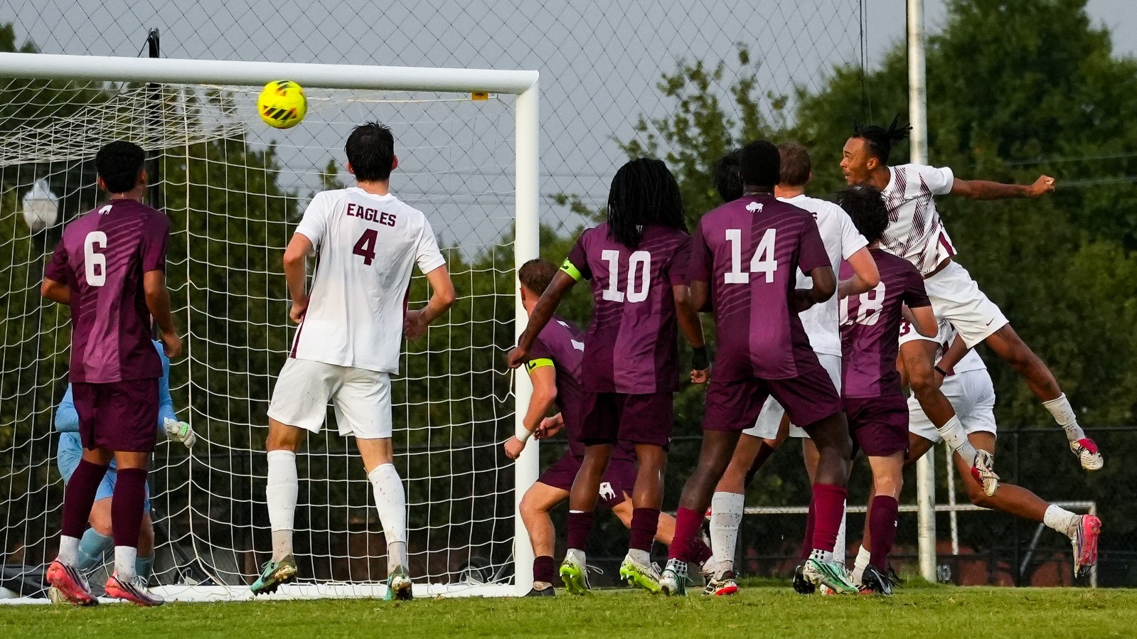Tyler Ackah-Wheatcroft Skies above the WT defense to score on a header