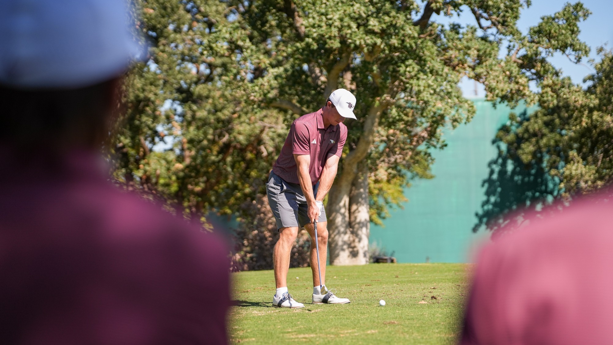Christian Yanovitch tees off on a hole at the 2026 Skip Wagnon Invitational 