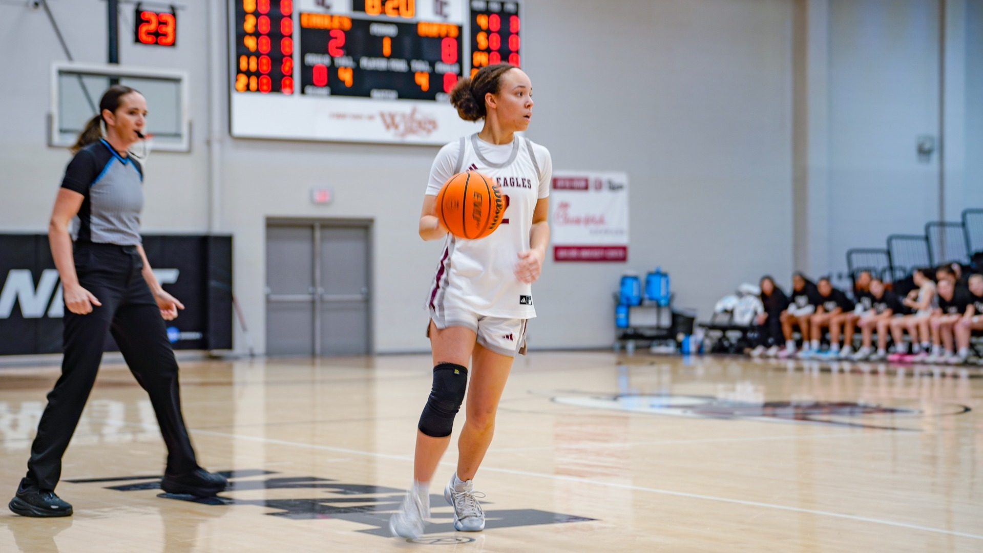 Trinity Dobbs at the top of the key