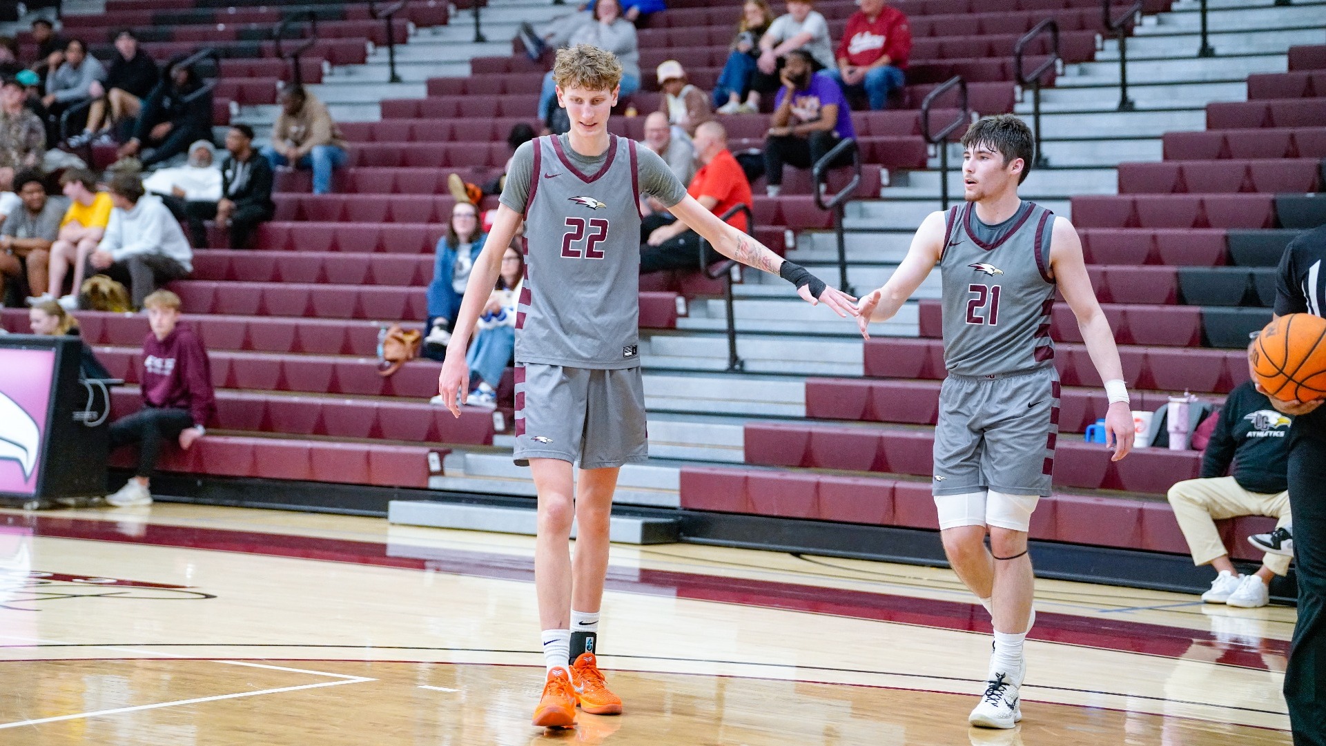 Carson Jones high-fiving Noah Clark