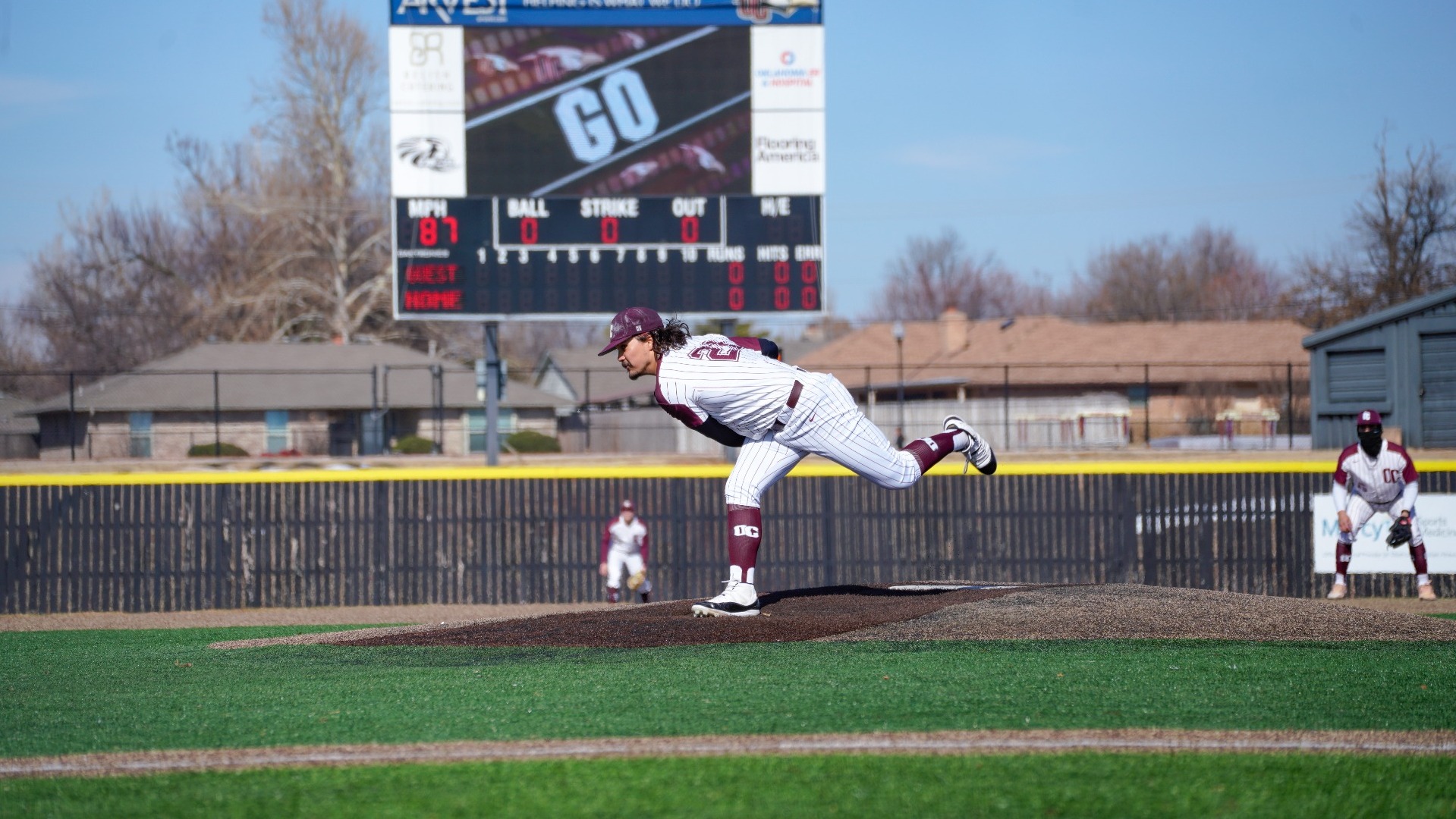 Corbin Kwan pitching follow-through