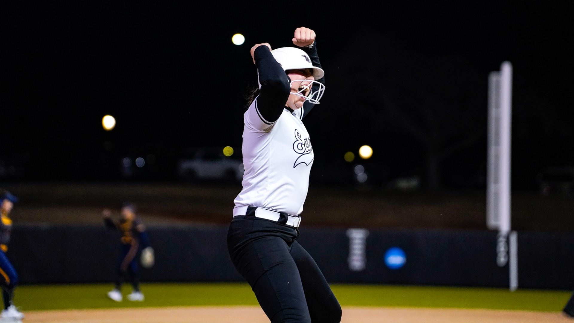 Resendiz celebrating at third base