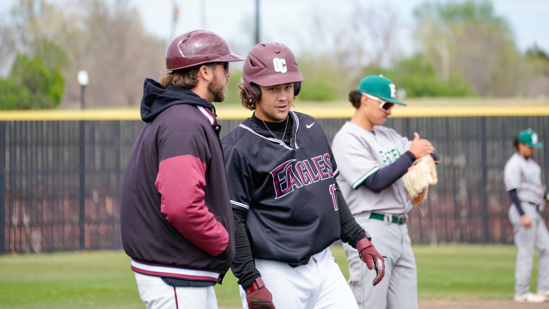 Sanderson with third-base coach