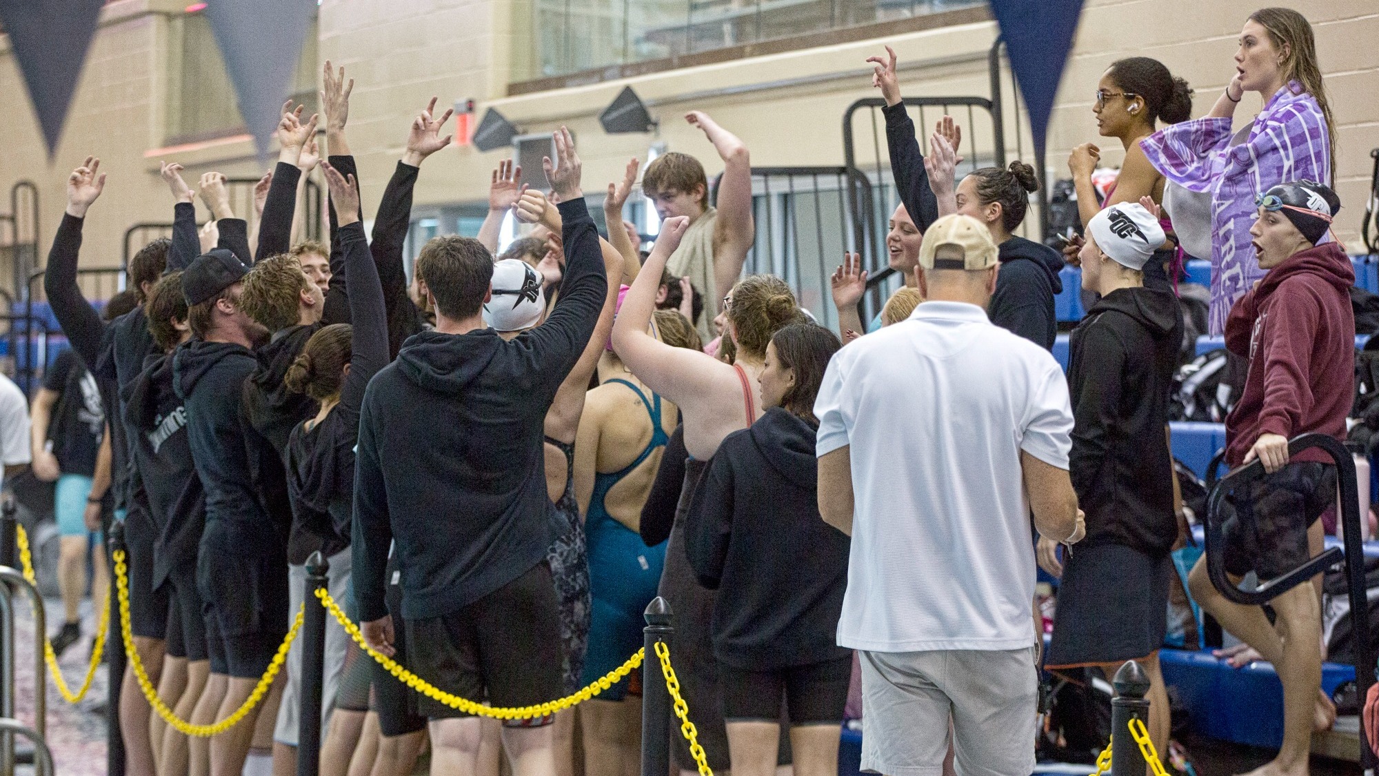 Swim Breaks Down the Huddle at a meet in 2025