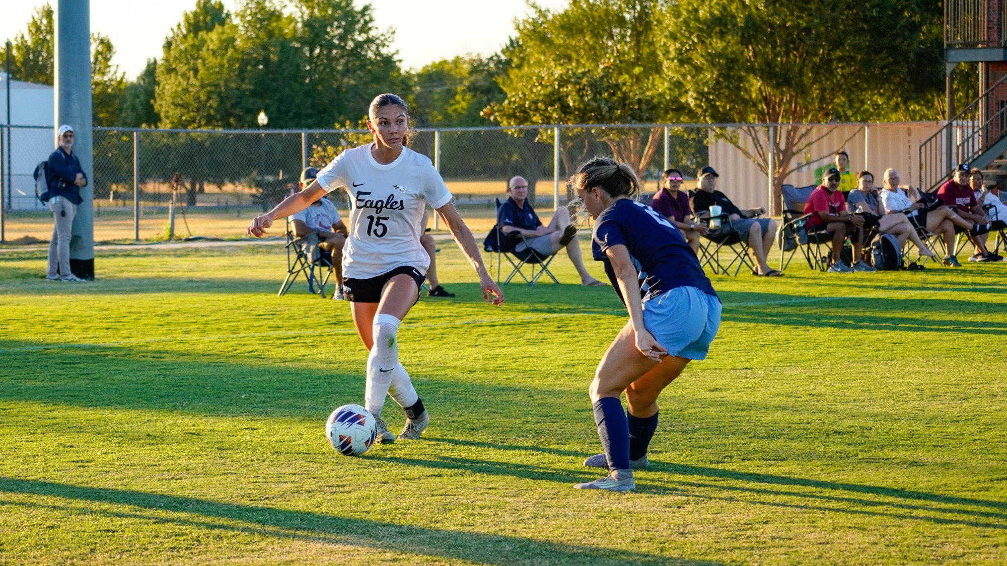 Munson looks to juke passed defender