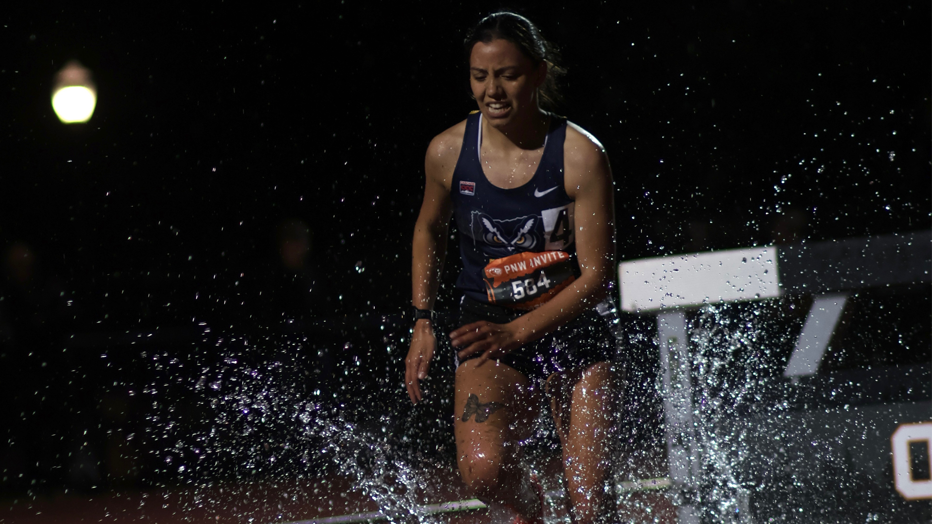 Saundra Parsons in steeple water pit at OSU