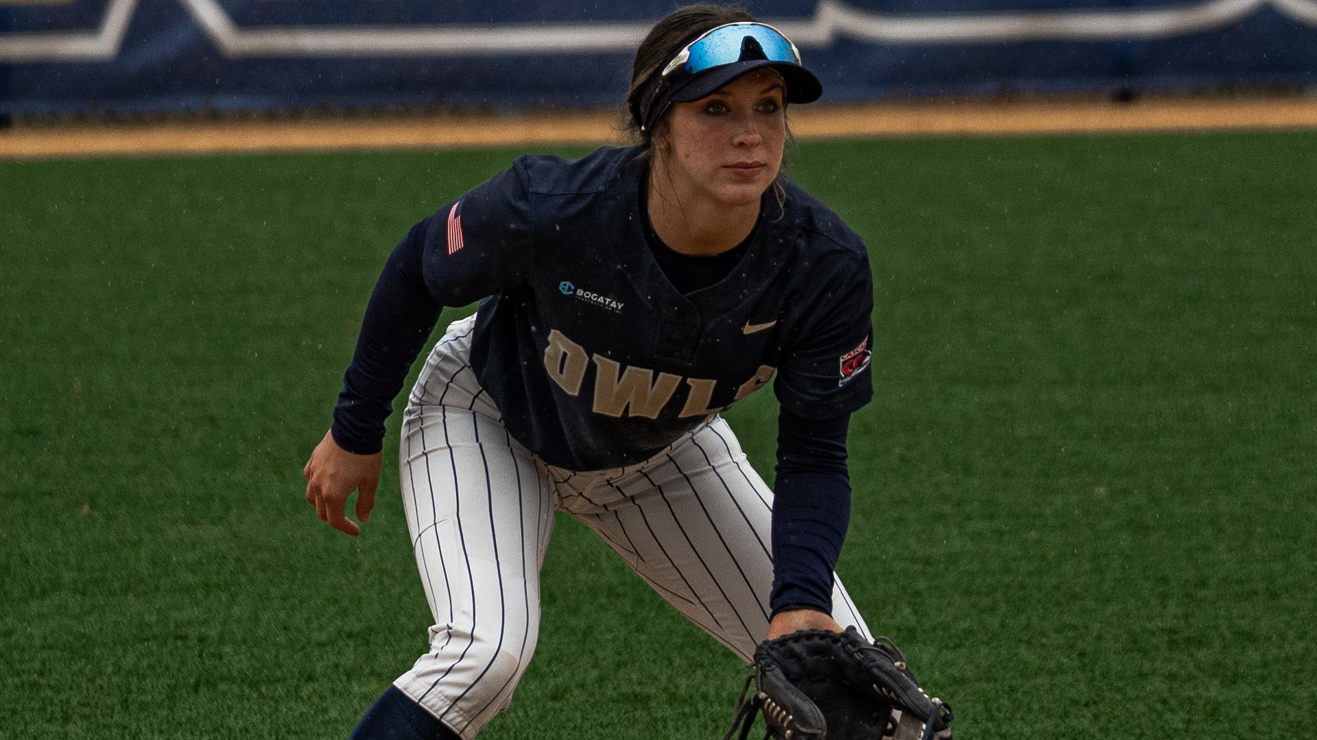Gina Allen setting up to play shortstop vs. C of I 