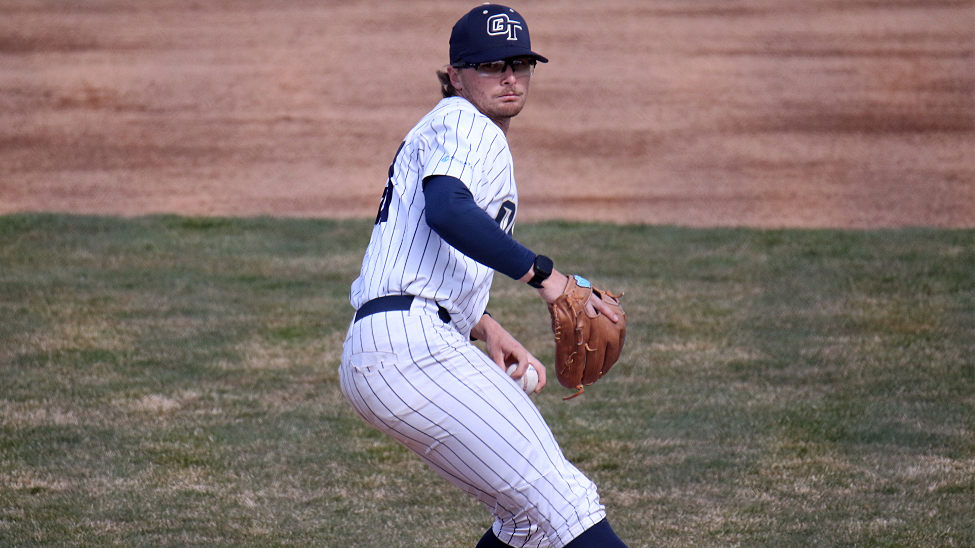 Carson Glavich throwing a pitch vs. EOU