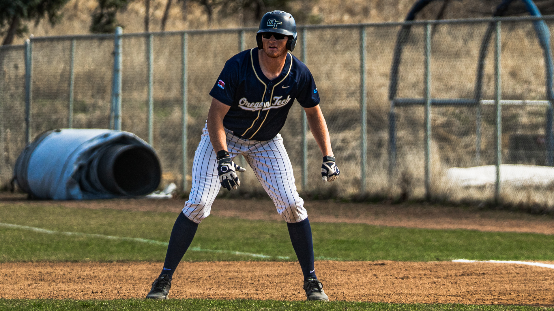 Jacob Cook taking a lead off first base