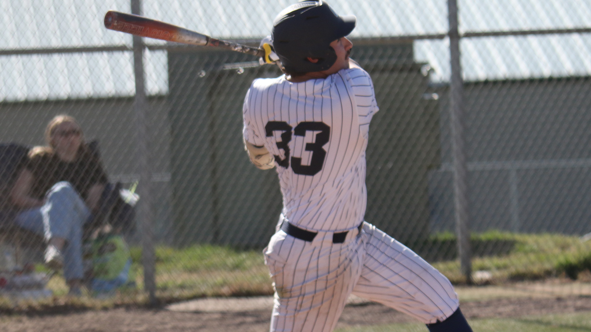 Dylan Edwards swinging at home plate