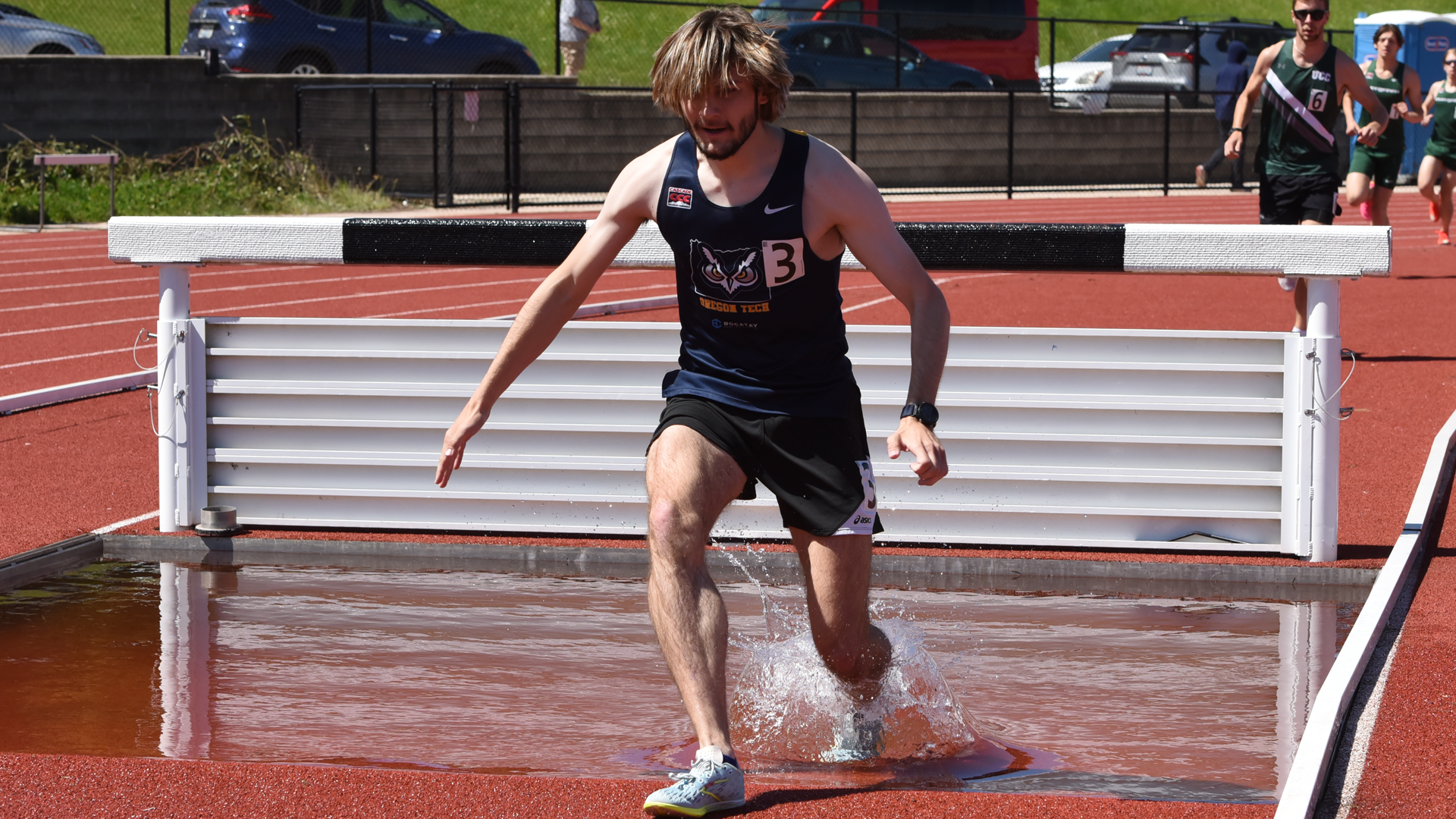 Tucker Piper leaving water pit in steeplechase