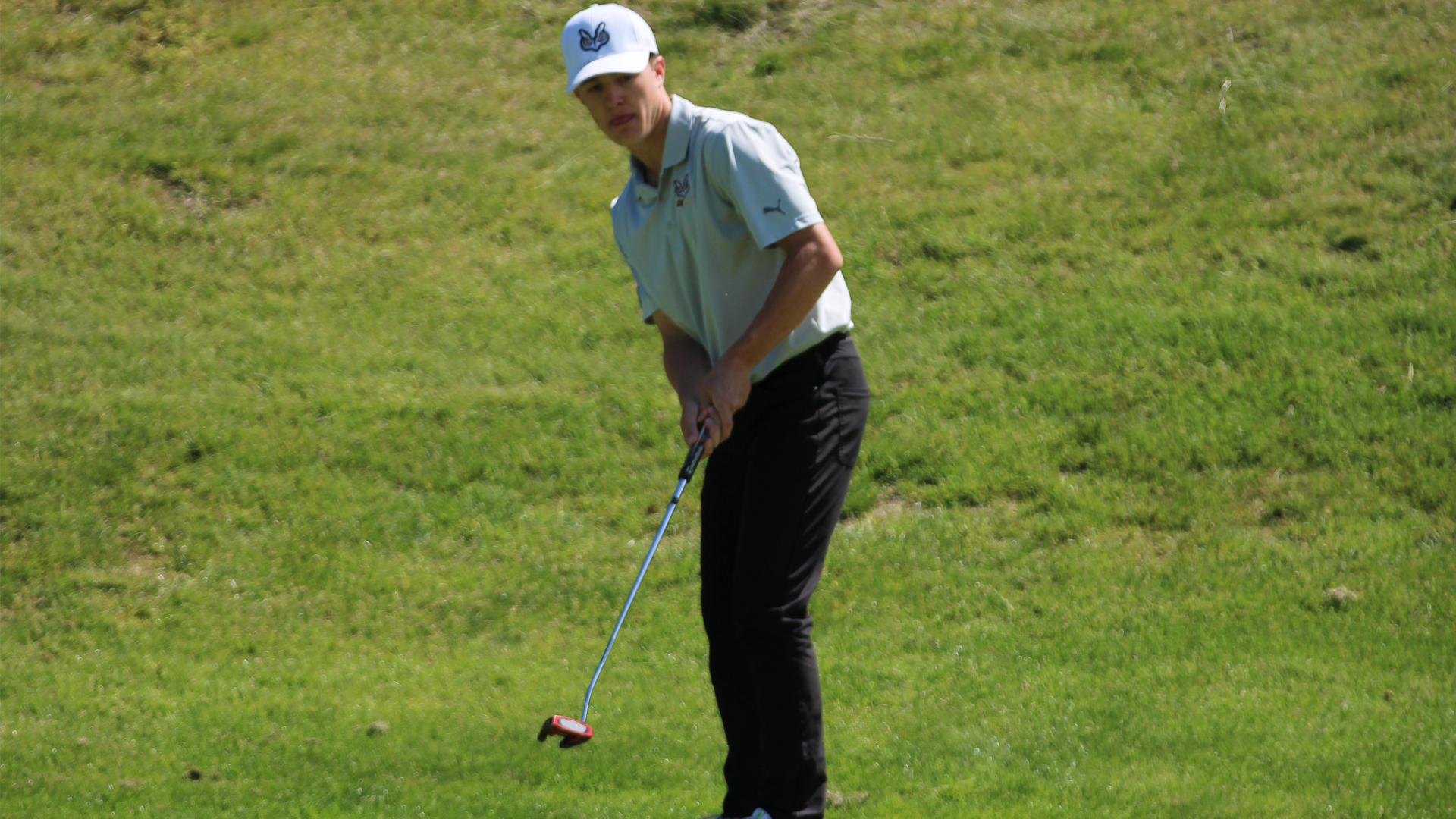 Grayson Moore Putting on a Green
