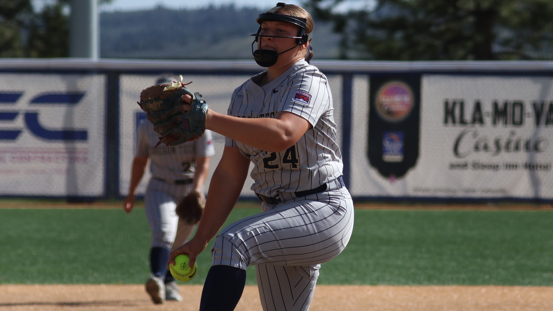 Kristine Schmidt throwing a pitch