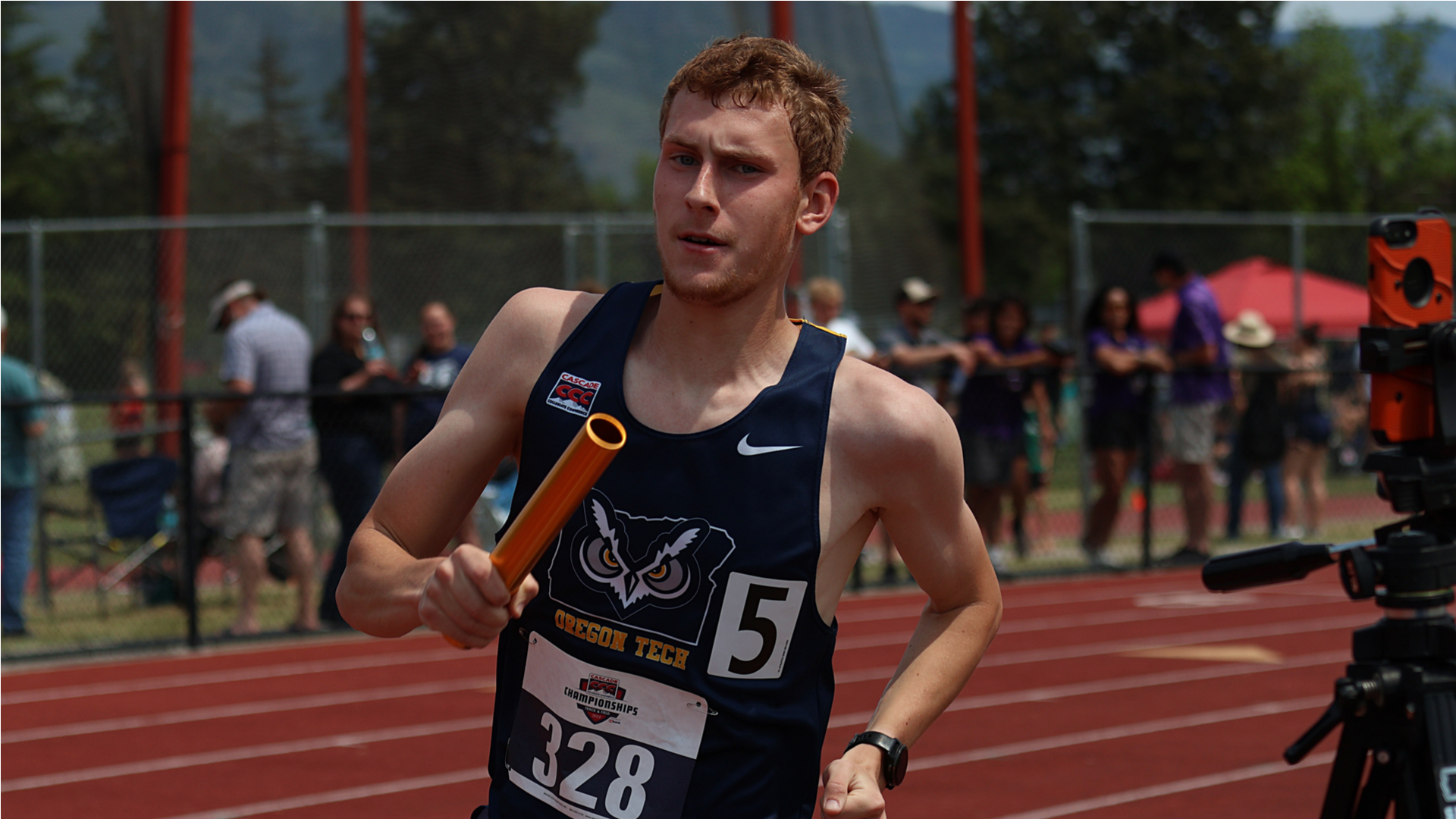 Relay runner with baton