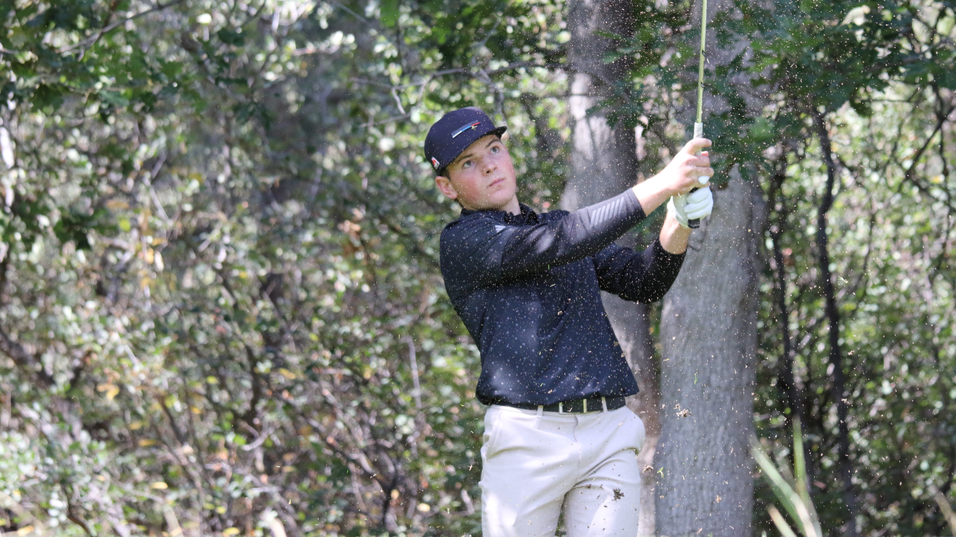 Golfer Swinging Club