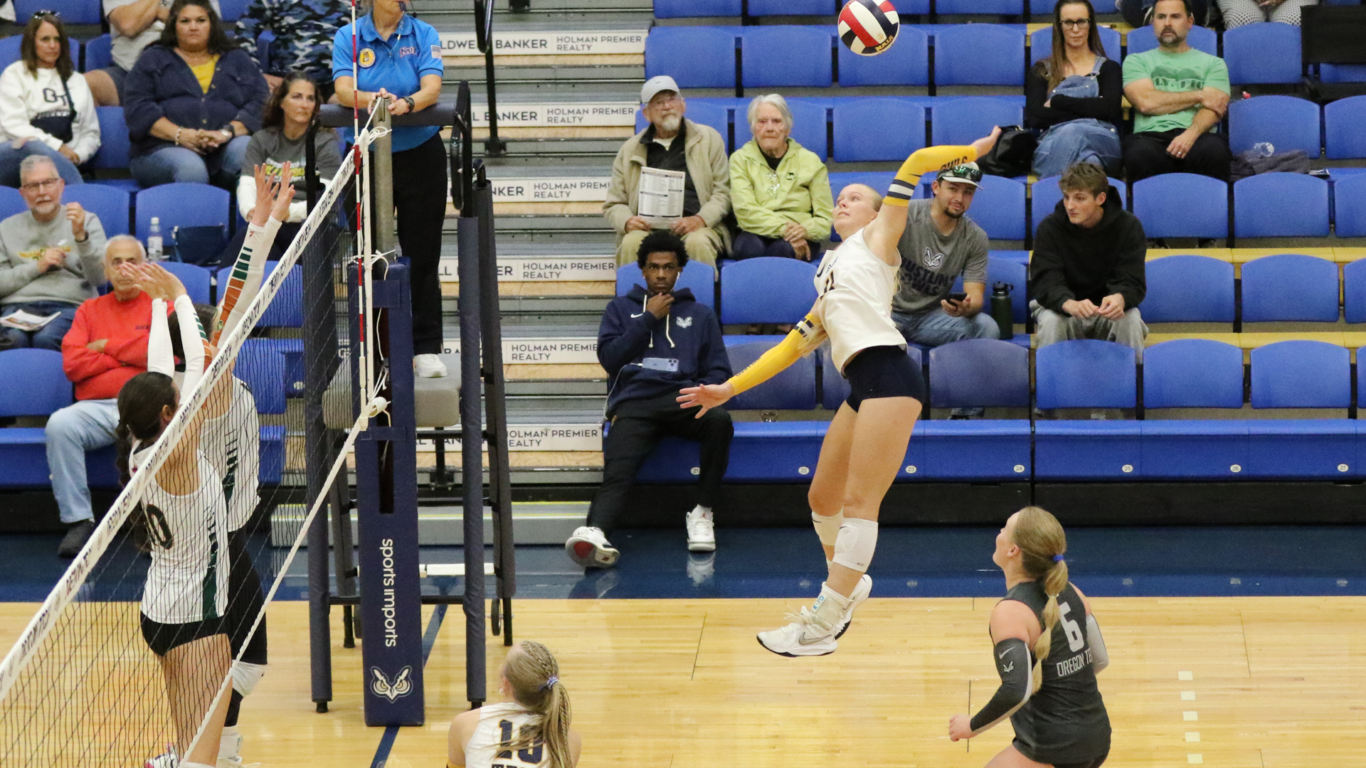 Volleyball Player hitting ball