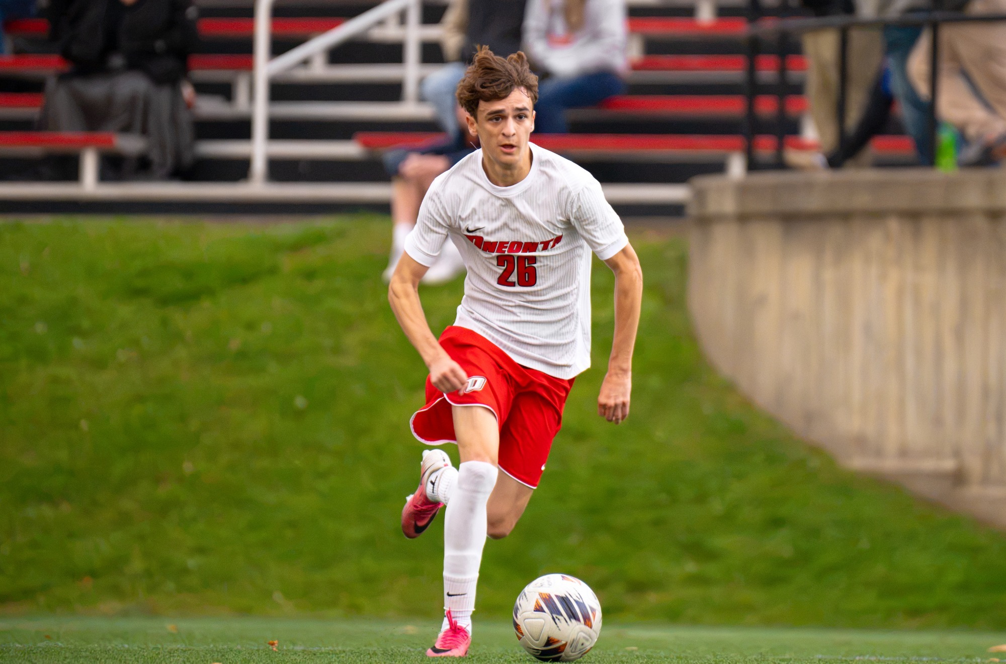 Klement Bujaj moves the ball up the field against Cobleskill