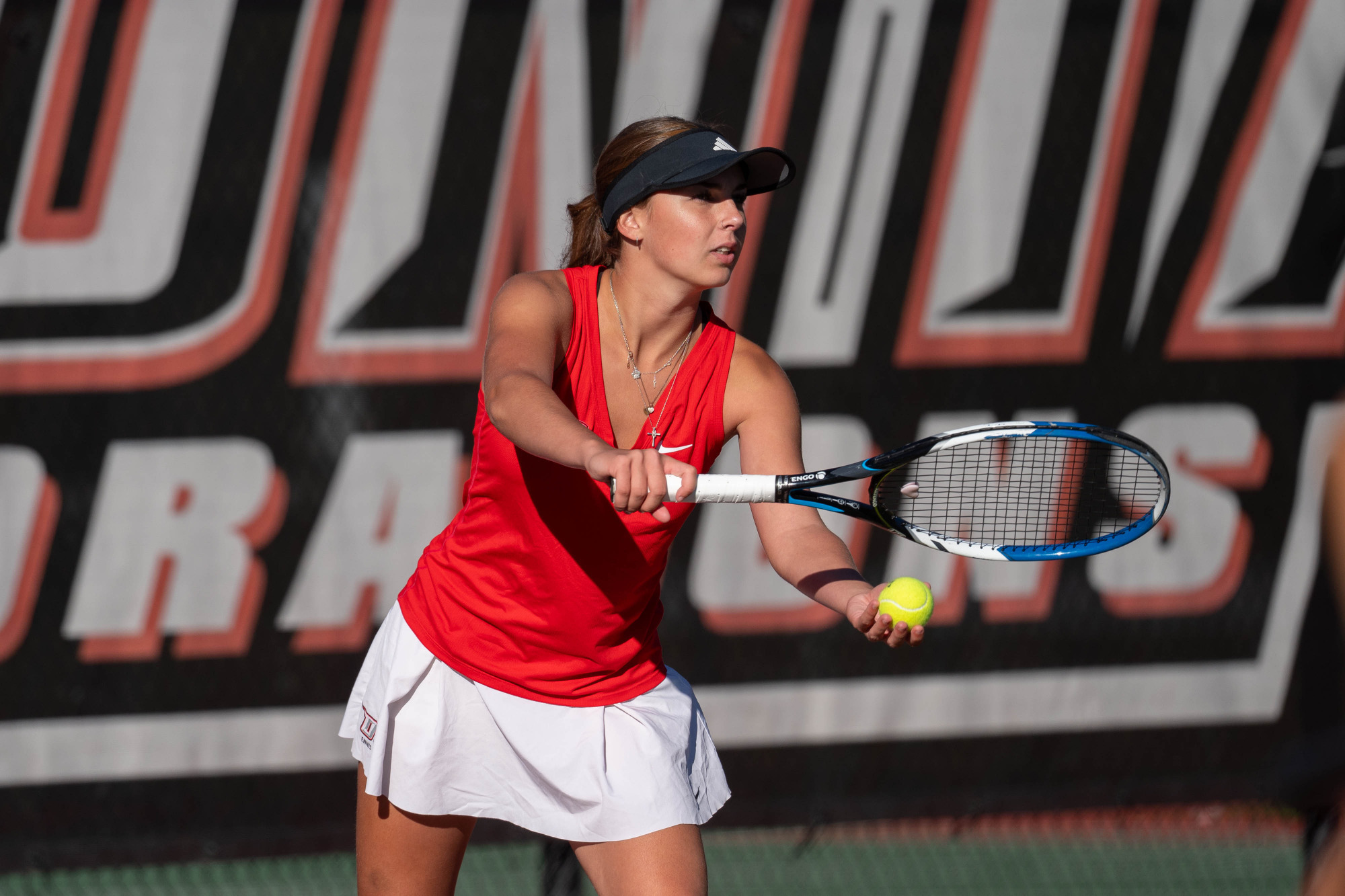 Trinity Lyons gets ready to serve against Cortland