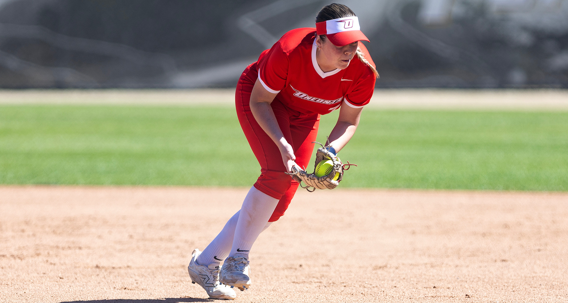 Rylee McGinness collects ground ball against Whittier College