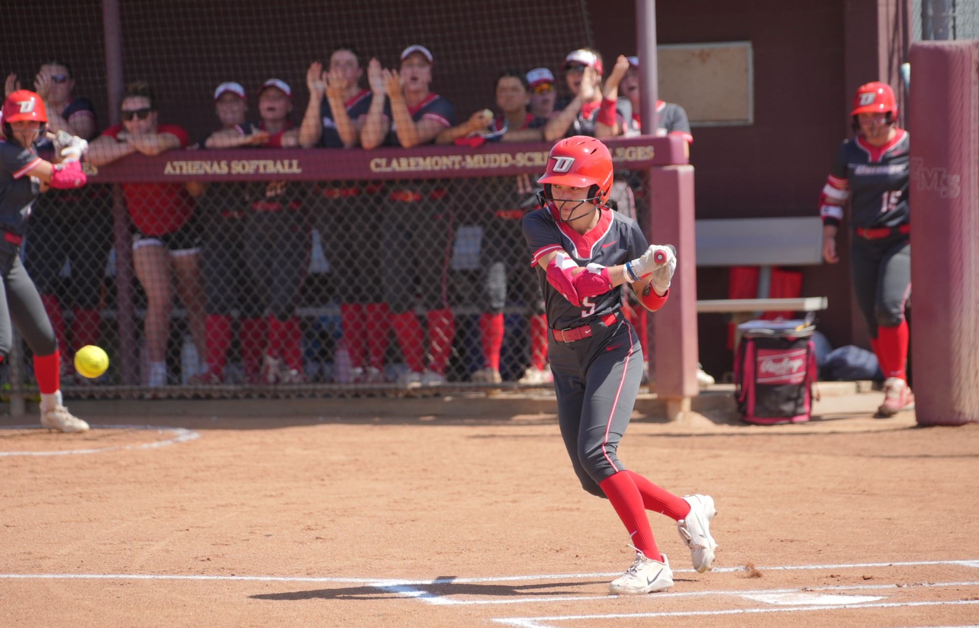 Sophia Camacho prepares to hit the ball against Claremont Mudd Scripps