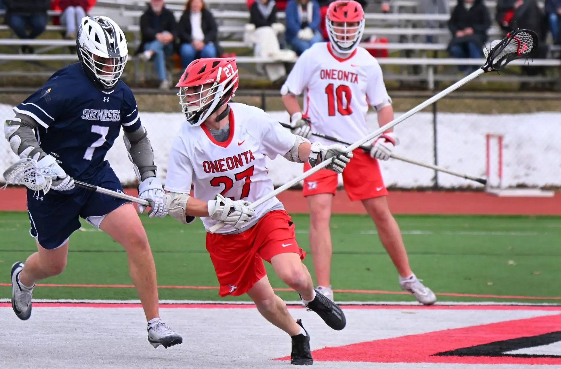 Aidan Greene brings the ball up the field against Geneseo