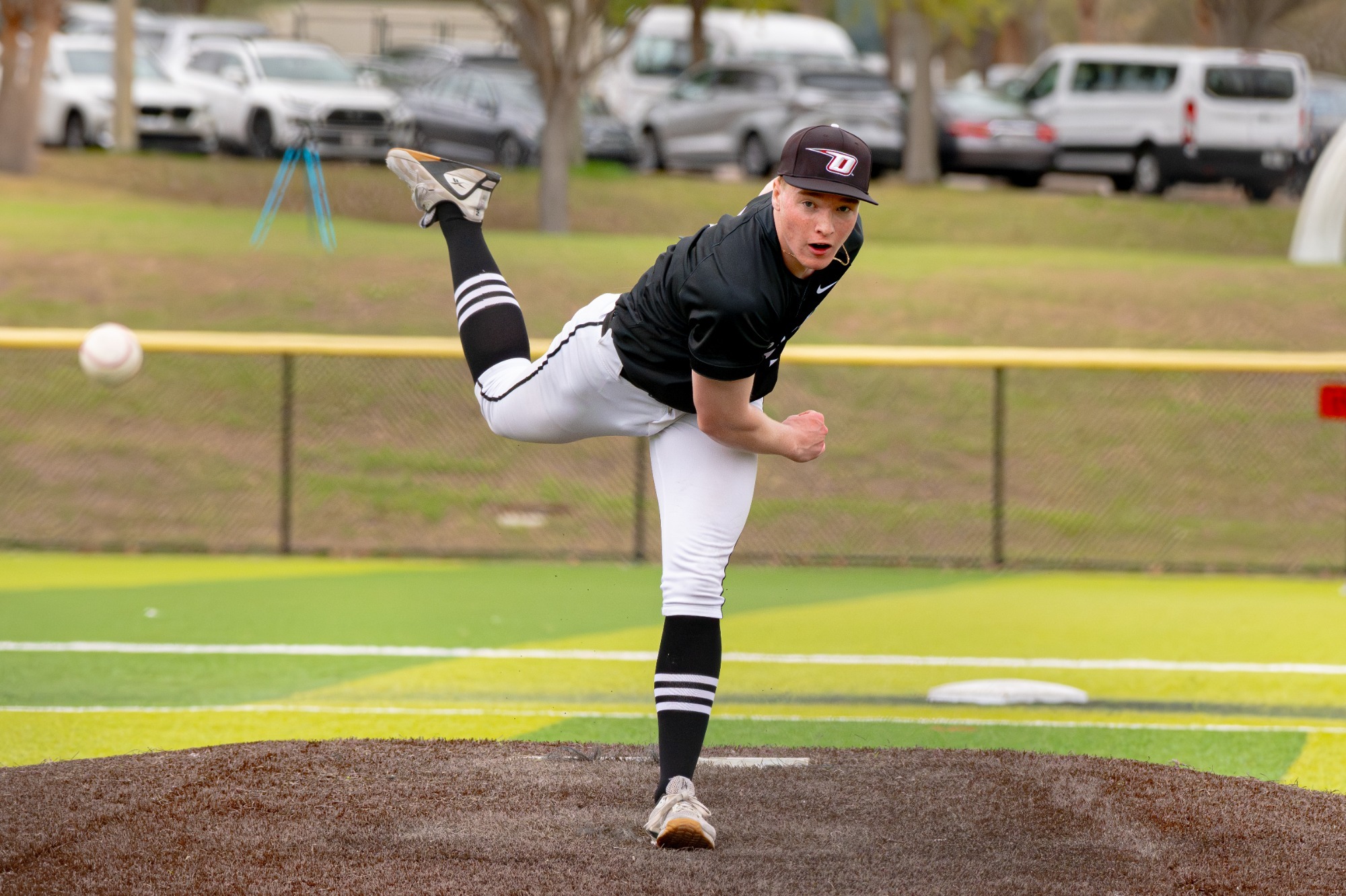 Jake Quigley follow-through on a pitch