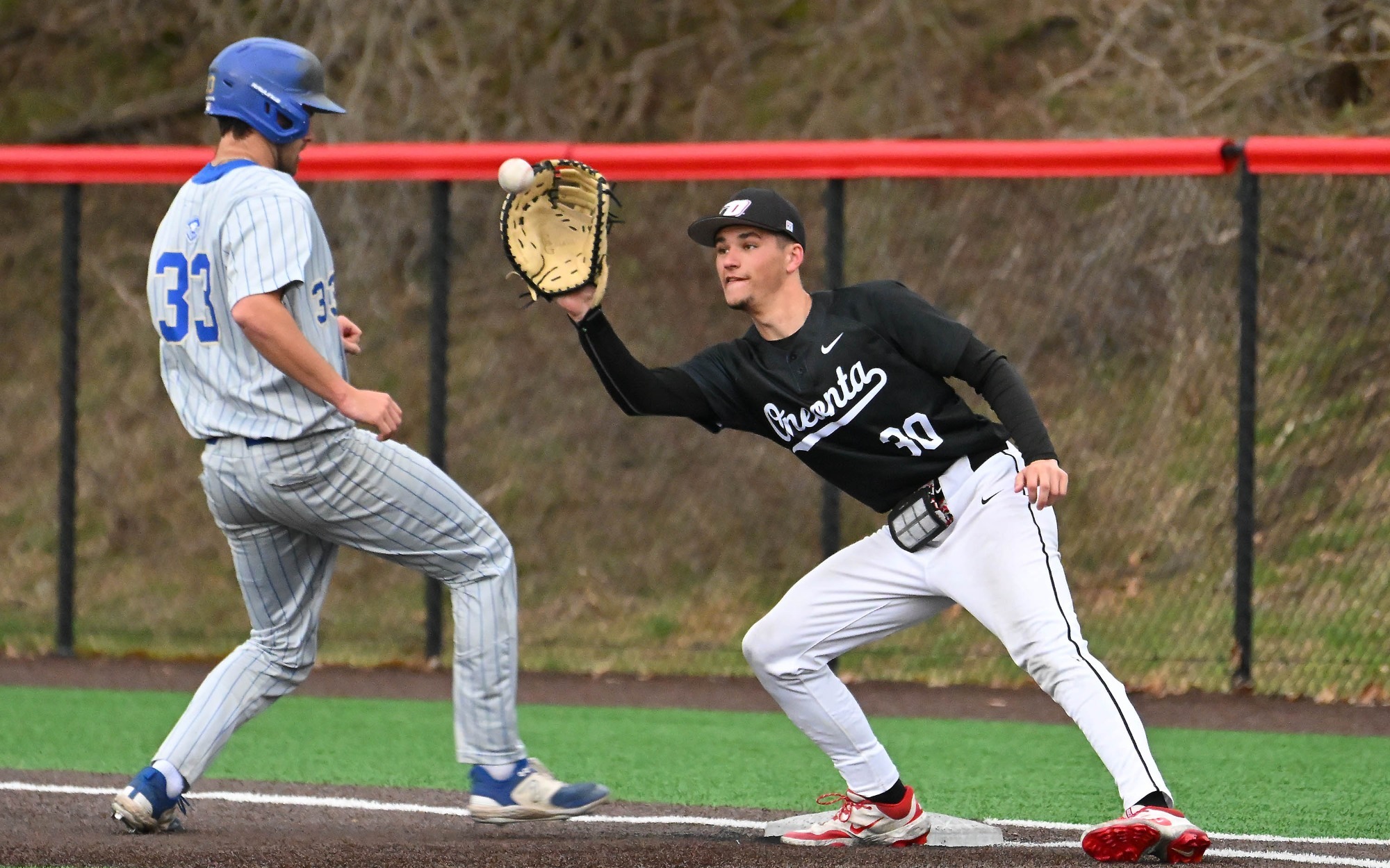 Zach Rowe at first base for Oneonta baseball
