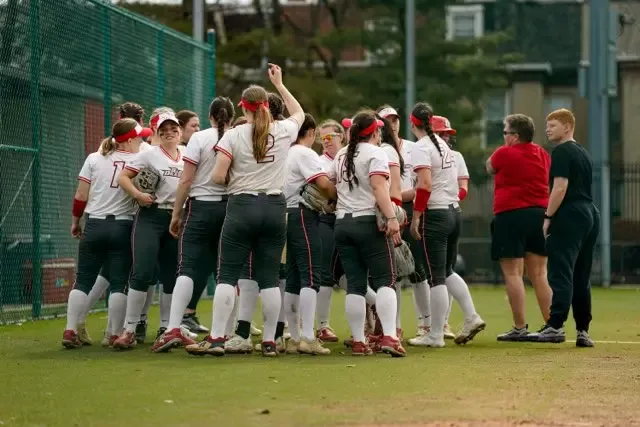 Softball Team Huddles at Rutgers Camden