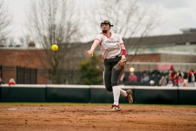 Emily Brown pitching against Rutgers Camden in season opener