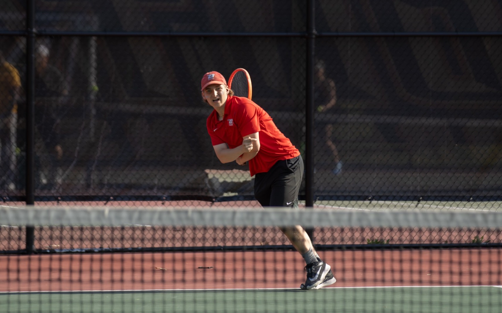 Jake Mayola completes a serve against Delhi