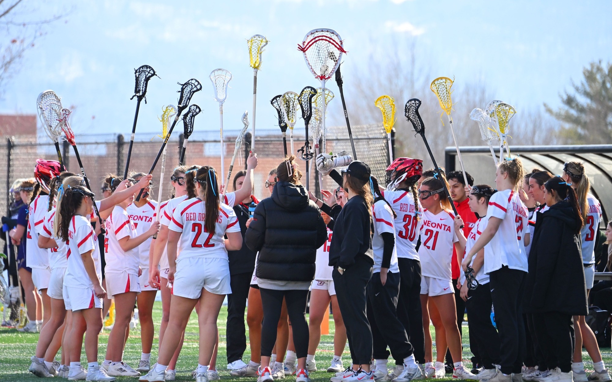 Oneonta women's lacrosse team huddle